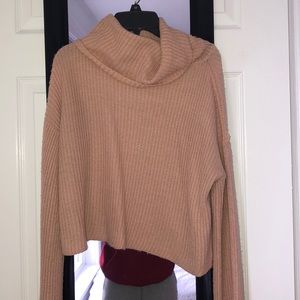pink sweater with loose turtleneck
